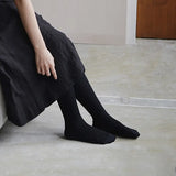 NISHIGUCHI KUTSUSHITA Merino Wool Ribbed Tights - Black